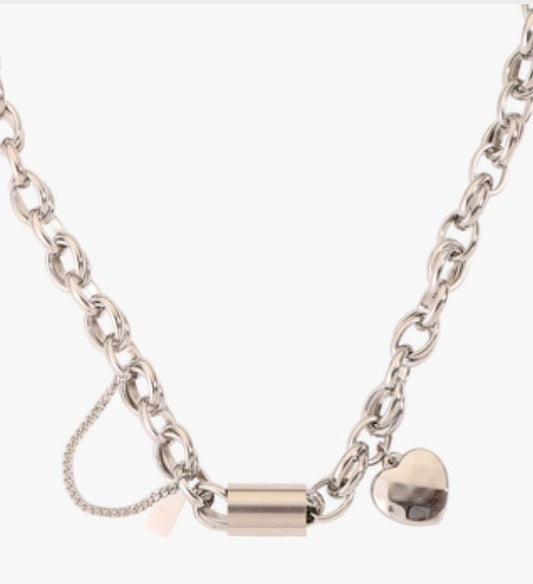 Titanium bracelet with heart pendant, silver-toned chain by Ancient Energy.