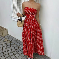 Dress: red polka-dot strapless maxi by Ancient Energy, high-waist; with straw handbag