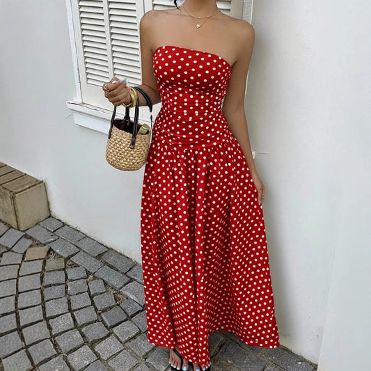 Dress: red polka-dot strapless maxi by Ancient Energy, high-waist; with straw handbag
