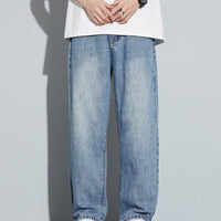 Fleece-lined American-style retro men's straight-leg denim pants in light blue.