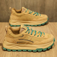 Ancient Energy casual dad shoes; tan suede sneakers with teal laces and teal outsole, pair