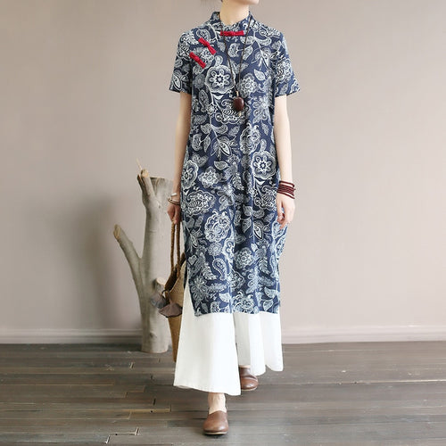 Mandotos International retro floral cotton dress with side slit, featuring a vintage-inspired design and vibrant flower pattern.