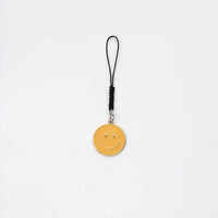 Cross-border e-commerce alloy color dripping smiley face keychain electroplated gold irregular expression bag pendant accessories