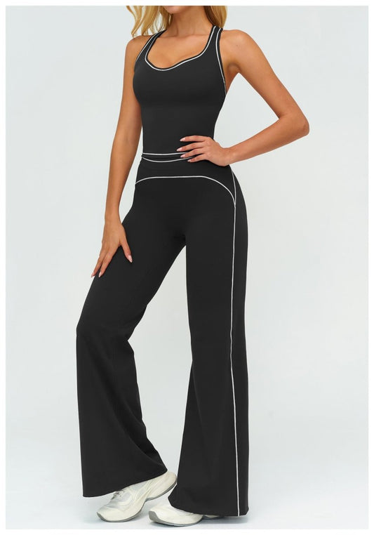 Womens yoga set 2-piece: black sleeveless V-neck top with white piping and matching slim straight pants