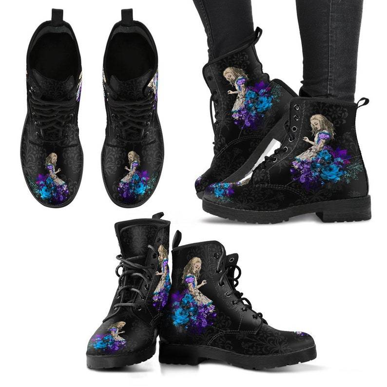 Pair of Gothic print vegan leather combat boots by Ancient Energy, black with purple-blue floral accents.