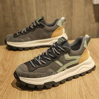 Versatile casual dad shoes by Ancient Energy, a pair of dark grey Converse-style sneakers with a chunky sole