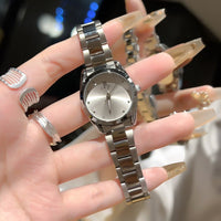 Ladies steel-band wristwatch by Ancient Energy, silver-tone bracelet with minimalist dial