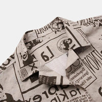 3XL men's vintage Hawaiian shirt with newspaper print from Ancient Energy, featuring bold tropical design and relaxed fit.