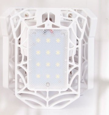Ancient Energy 60W super bright deformable LED light for gym, warehouse, or garage, emitting 6000 lumens of clear white light.