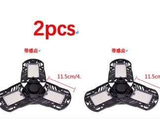 Ancient Energy 60W deformable LED light illuminating gym, warehouse, or garage with 6000 lumens brightness.