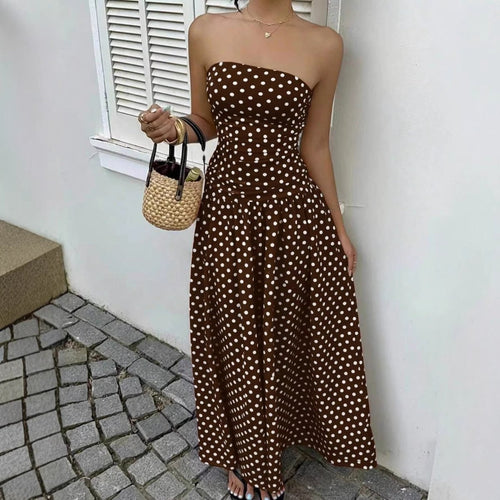 Dress by Ancient Energy: brown strapless polka-dot maxi with high-waist silhouette