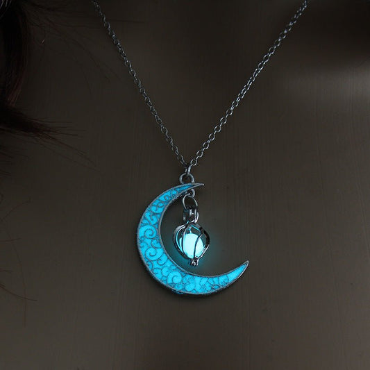 Silver plated glowing pendant necklace with chain from Ancient Energy, featuring a luminous pendant design.