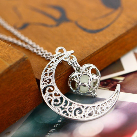 Silver plated glowing pendant necklace with chain from Ancient Energy, featuring a luminous pendant on a sleek silver chain.
