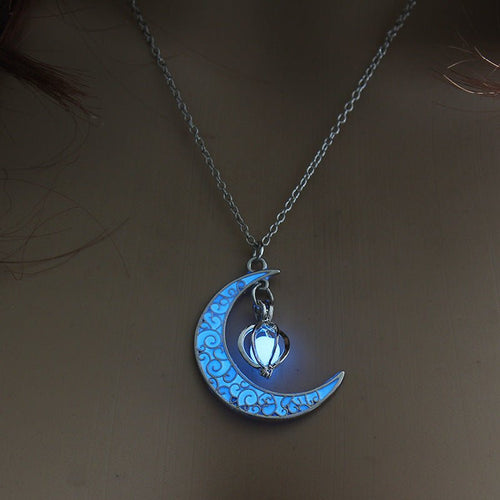 Silver plated glowing pendant necklace with chain from Ancient Energy, featuring a luminous pendant design.