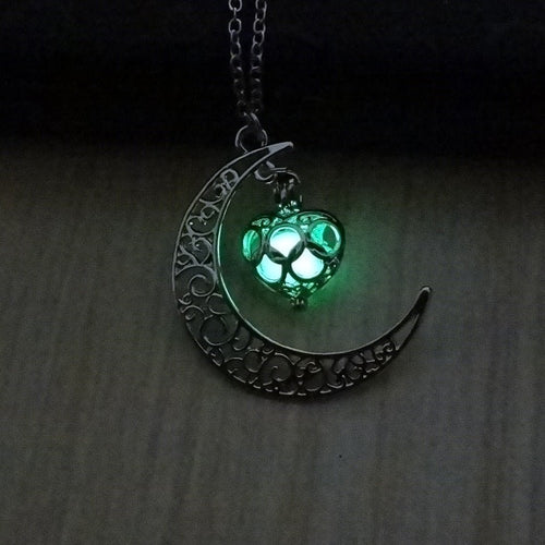 Silver plated glowing pendant necklace with chain from Ancient Energy, featuring a luminous pendant design.