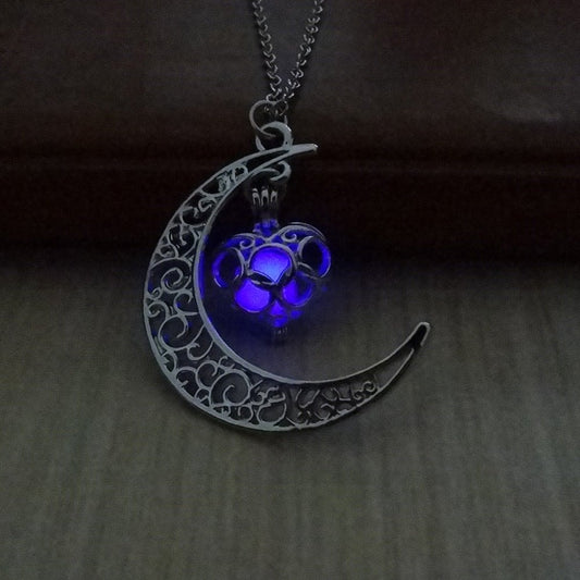 Silver plated glowing pendant necklace with chain from Ancient Energy, featuring a luminous pendant against a plain background.