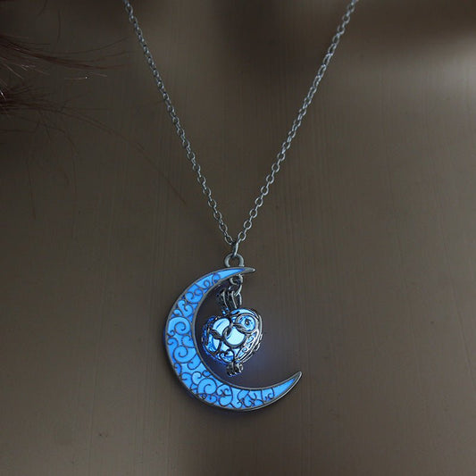 Silver plated glowing pendant necklace with chain from Ancient Energy, featuring a luminous, stylish design.