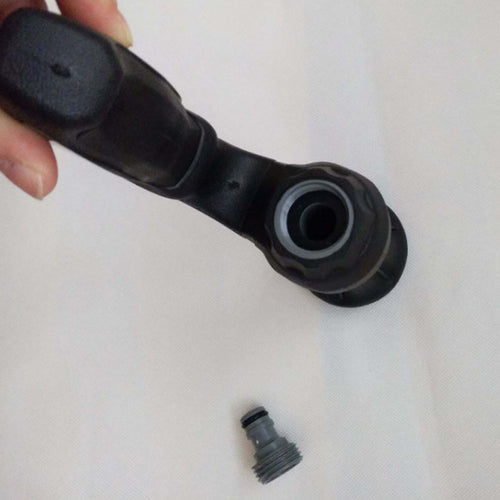 Ancient Energy Mighty Power Hose Blaster Nozzle for lawn, garden, and car washing, attached to a garden hose.