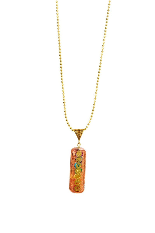 Seven chakra orgone copper pendant with chain, featuring colorful chakra symbols and a polished finish, designed for energy balancing.