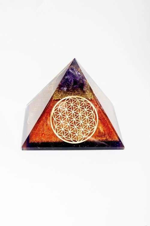 Flower of Life Copper Orgone Pyramid with Amethyst from Ancient Energy, authentic orgone pyramid with intricate design and purple amethyst.