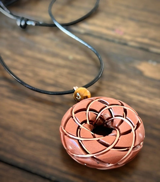 Ancient Energy copper Torus Vortex pendant necklace with Tigers Eye gemstone and Rodin coil design.