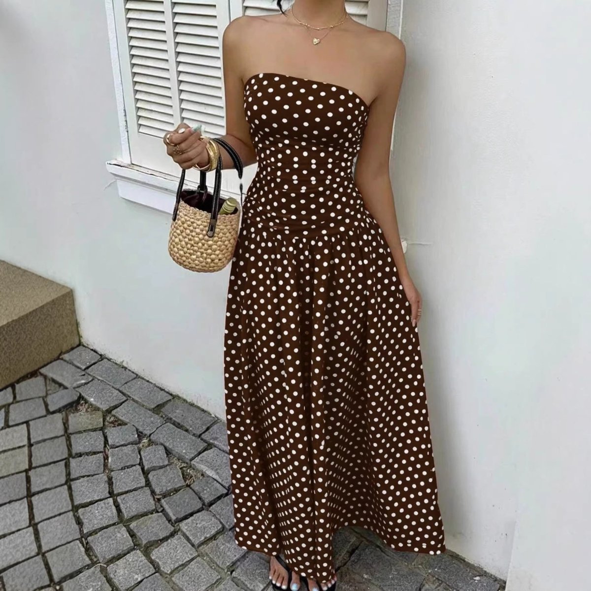 Dress by Ancient Energy: brown strapless polka-dot maxi with high-waist silhouette