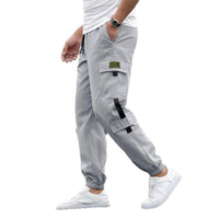 Mens gray retro jogger pants with cargo pocket, black strap accents, elastic cuffs, Ancient Energy.