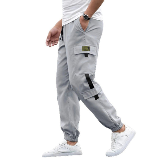 Mens gray retro jogger pants with cargo pocket, black strap accents, elastic cuffs, Ancient Energy.