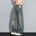 Men's straight-leg denim jeans in washed blue with faded panels.