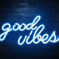 Led transparent backboard neon light sign reading good vibes in blue, wall-hung decorative sign.