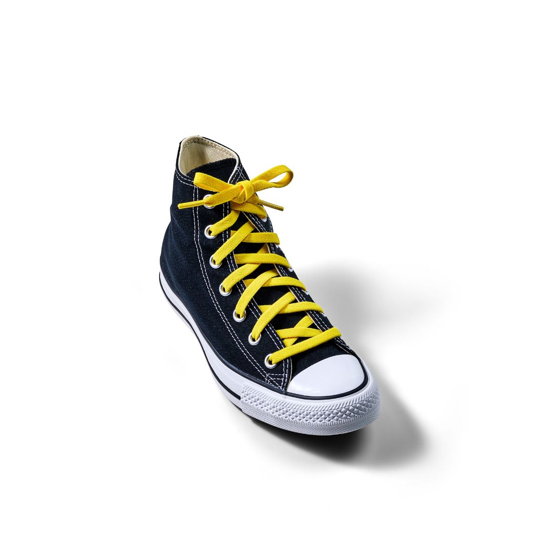 Yellow elastic shoelace by Bread, designed for easy slip-on shoes, shown in the image with a close-up of the laces
