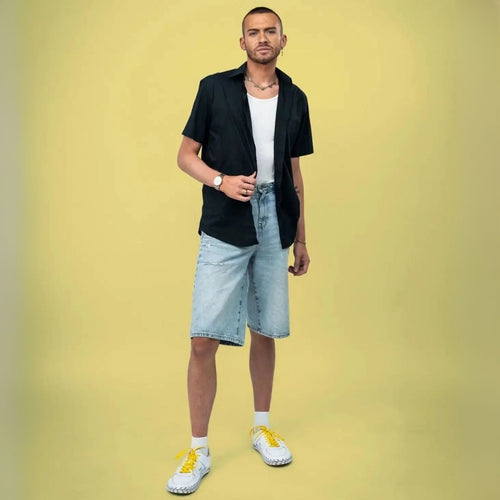 Yellow elastic shoelace by Bread, designed for easy slip-on footwear, with a bright, vibrant color and flexible stretch.
