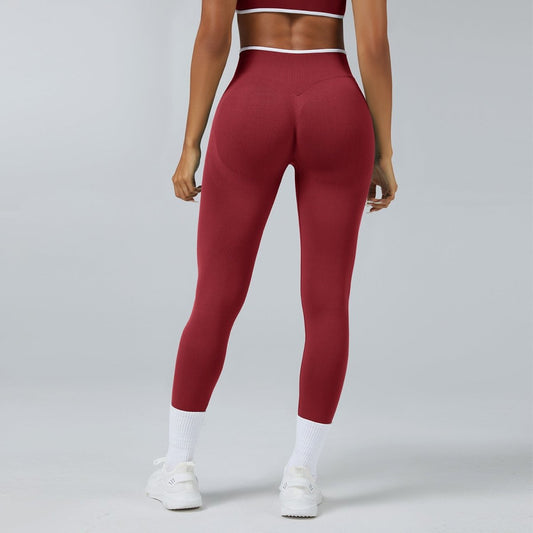 Seamless Knitted Tight High Waist Quick-drying Sports Yoga Pants in burgundy, back view on model.