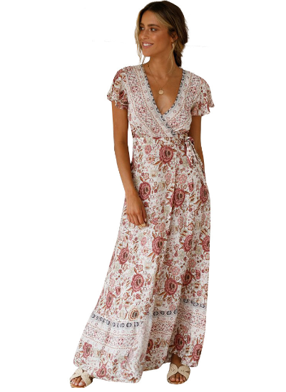 Mandotos International Tropical Bloom Maxi Dress featuring vibrant floral patterns and flowing fabric, perfect for summer wear.