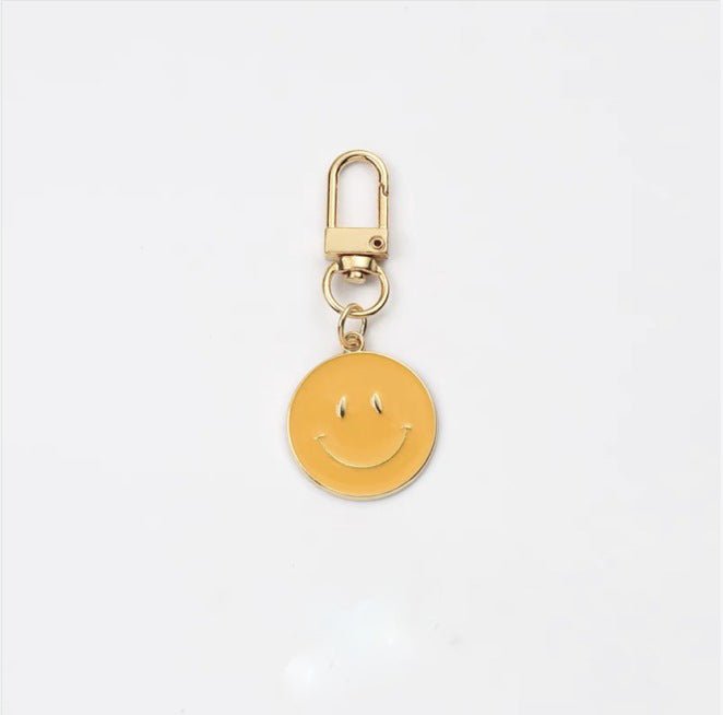 Cross-border e-commerce alloy color dripping smiley face keychain electroplated gold irregular expression bag pendant accessories - MANDOTOS INTERNATIONAL