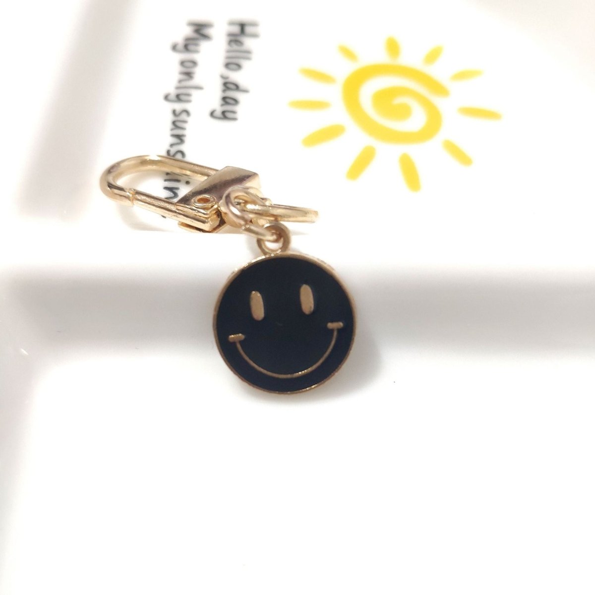 Cross-border e-commerce alloy color dripping smiley face keychain electroplated gold irregular expression bag pendant accessories - MANDOTOS INTERNATIONAL