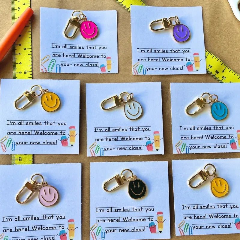 Cross-border e-commerce alloy color dripping smiley face keychain electroplated gold irregular expression bag pendant accessories - MANDOTOS INTERNATIONAL