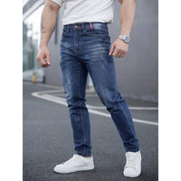 Mens ripped denim jeans with cat-whisker scratches, blue, Ancient Energy.