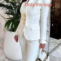 Solid white blazer and high-waisted pants set with gold buttons by Ancient Energy