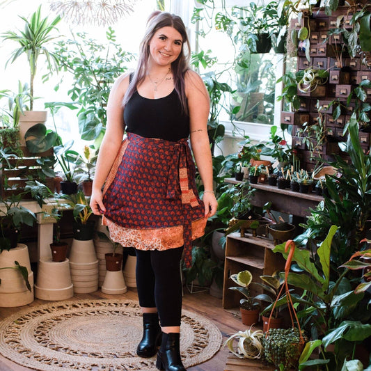 Darn Good Yarn The Original Sari Wrap Skirt in warm tones, flowing maxi style with intricate sari fabric details.