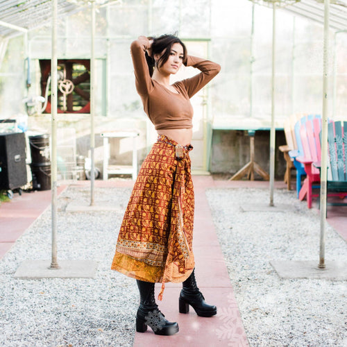 Darn Good Yarn The Original Sari Wrap Skirt in warm tones, showcasing a colorful, flowing maxi skirt with intricate sari fabric design