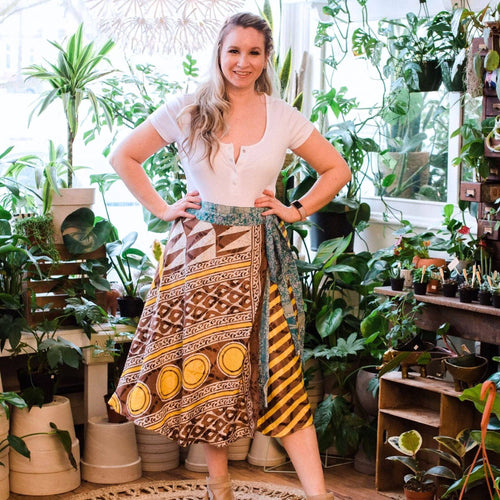 Darn Good Yarn The Original Sari Wrap Skirt in warm tones, flowing maxi design, made from colorful sari fabric for a boho look.