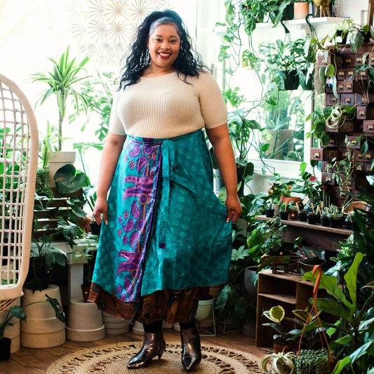 Darn Good Yarn The Original Sari Wrap Skirt in warm tones, featuring a colorful, flowing maxi design made from sari fabric.