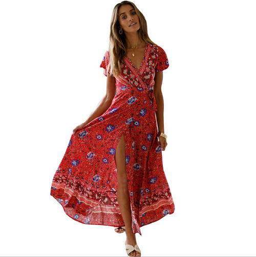 Mandotos International Tropical Bloom Maxi Dress featuring vibrant floral patterns and flowing fabric for a stylish summer look.