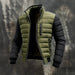 Puffer jacket for men in olive green with black sleeves, zip front, stand collar, and chest pockets.
