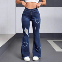 Stylish women's dark blue distressed denim jeans with heart-shaped patches, ripped details and frayed hems