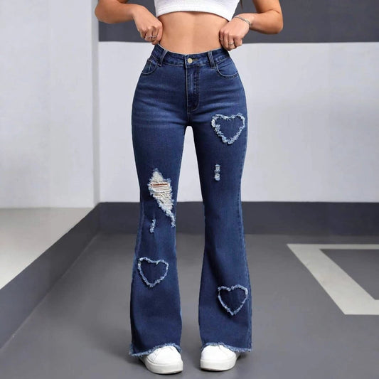 Stylish women's dark blue distressed denim jeans with heart-shaped patches, ripped details and frayed hems