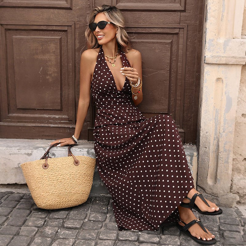 Polka-dot halter-neck maxi dress with V-neck in brown and white dots for women.