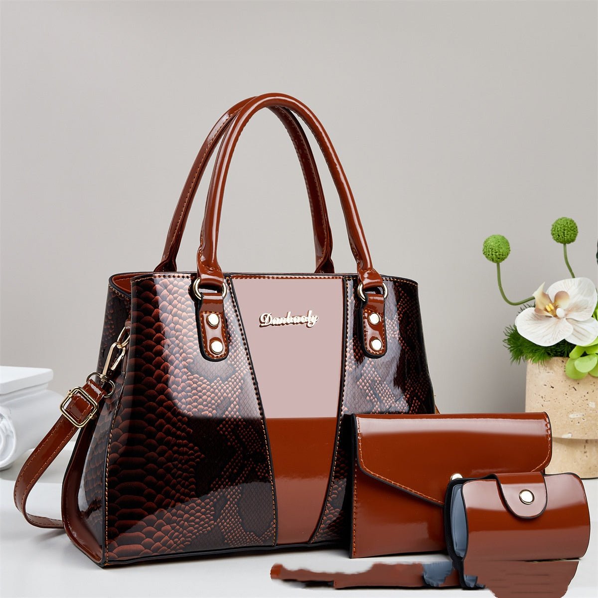 Large-capacity shouldercrossbody bag with brown snakeskin pattern; set of 3 including tote bag, matching wallet, and cylindrical purse.