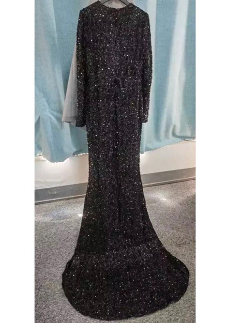 Grey long sleeve sequin evening dress by MANDOTOS, featuring a fitted silhouette and elegant design.